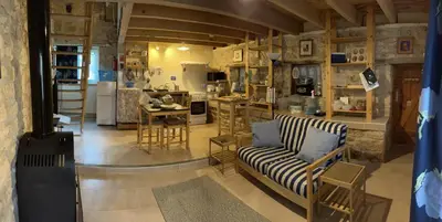 Coin salon dans l'établissement Gites Le Bois de l'Eglise