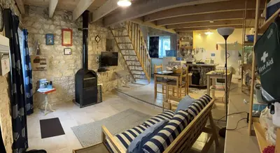 Télévision ou salle de divertissement dans l'établissement Gites Le Bois de l'Eglise
