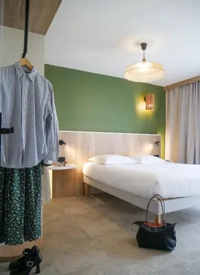 Un ou plusieurs lits dans un hébergement de l'établissement Best Western Le Bois de la Marche