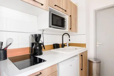 Cuisine ou kitchenette dans l'établissement Le Temple de La Rochelle