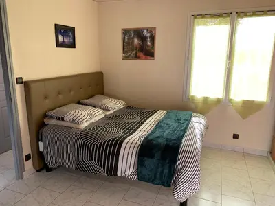 Un ou plusieurs lits dans un hébergement de l'établissement Gîte les Randonneurs