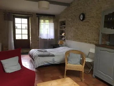 Un ou plusieurs lits dans un hébergement de l'établissement GITE DES CHOUETTES