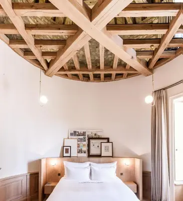 Un ou plusieurs lits dans un hébergement de l'établissement Domaine des Etangs, Auberge Collection