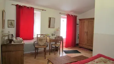 Un ou plusieurs lits dans un hébergement de l'établissement Le Clos de la Garenne Maison d'hôtes