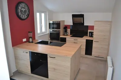 Cuisine ou kitchenette dans l'établissement L'EDEN DE LA HAUTE FORET - Classé 4 étoiles