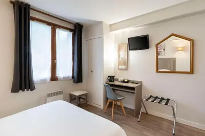 Télévision ou salle de divertissement dans l'établissement Sure Hotel by Best Western Saintes