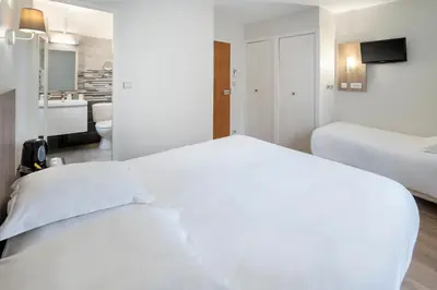 Un ou plusieurs lits dans un hébergement de l'établissement Sure Hotel by Best Western Saintes