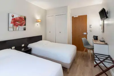 Un ou plusieurs lits dans un hébergement de l'établissement Sure Hotel by Best Western Saintes