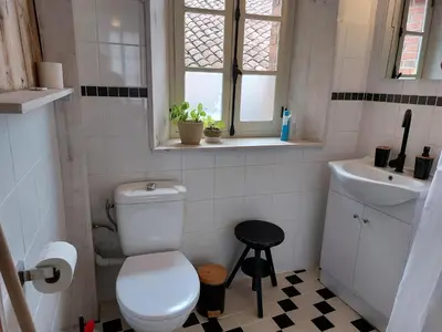 Salle de bains dans l'établissement La Poste Saulgond