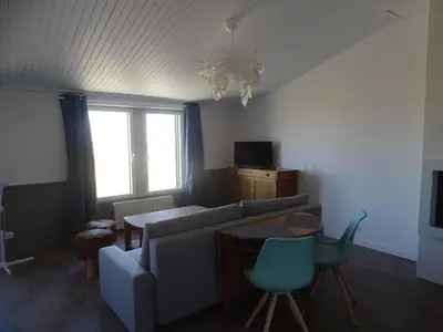 Télévision ou salle de divertissement dans l'établissement La maison de Gaston Port des Barques