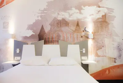 Un ou plusieurs lits dans un hébergement de l'établissement ibis Styles Poitiers Centre