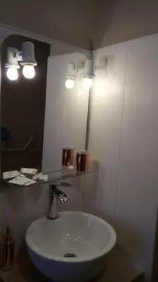 Salle de bains dans l'établissement Hôtel Montespan