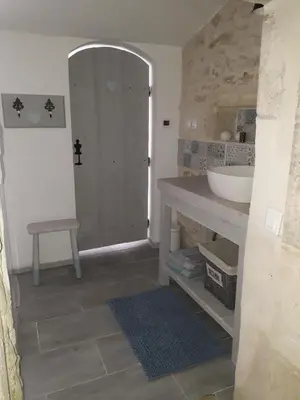 Salle de bains dans l'établissement l' Oiseau Bleu