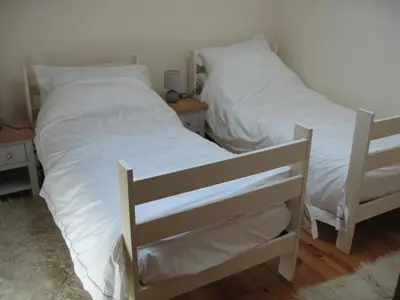 Un ou plusieurs lits dans un hébergement de l'établissement Gite du Puits - Bréville