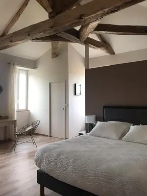 Un ou plusieurs lits dans un hébergement de l'établissement La Clé du Puy