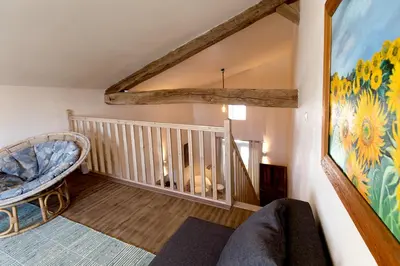 Coin salon dans l'établissement Appartement La Haute Preze & Golffrance