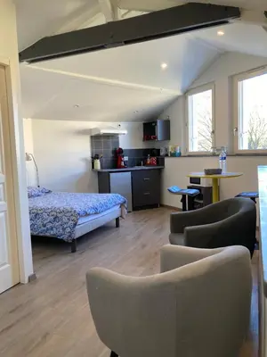 Un ou plusieurs lits dans un hébergement de l'établissement Studio Cosy