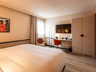 Un ou plusieurs lits dans un hébergement de l'établissement Mercure Angoulême Hôtel de France
