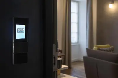 Coin salon dans l'établissement Appart Hôtel - Hyper Centre - VILLA CÔTÉ PLATEAU - 3 Étoiles Certifiées-