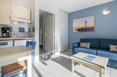 Cuisine ou kitchenette dans l'établissement Résidence Odalys Les Terrasses de Fort Boyard