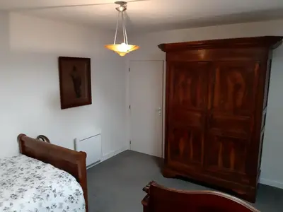 Un ou plusieurs lits dans un hébergement de l'établissement Wisteria Cottage