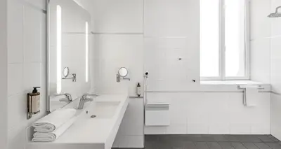 Salle de bains dans l'établissement Best Western Plus Poitiers Centre Le Grand Hotel