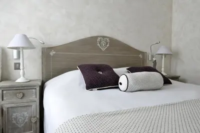 Un ou plusieurs lits dans un hébergement de l'établissement Grand Hôtel des Bains SPA