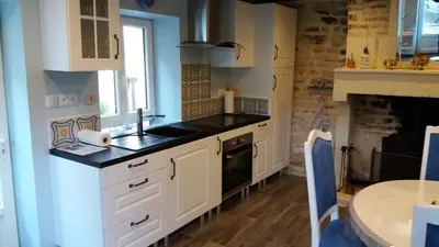 Cuisine ou kitchenette dans l'établissement Chez mémé Lisette