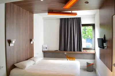 Un ou plusieurs lits dans un hébergement de l'établissement ibis Styles Niort Poitou Charentes
