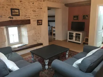 Télévision ou salle de divertissement dans l'établissement Apart d'Arc