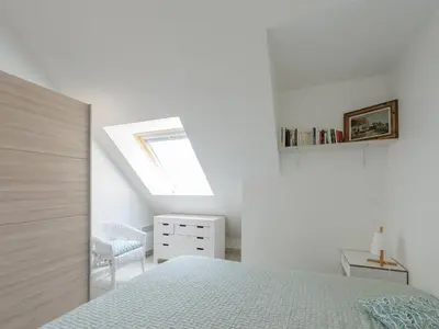 Un ou plusieurs lits dans un hébergement de l'établissement Appartement T2 en Front de Mer avec Balcon, Wifi et Parking - Châtelaillon-Plage - FR-1-258-188