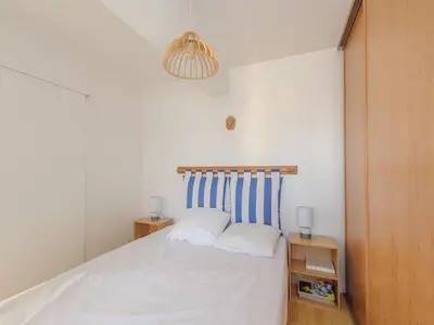 Un ou plusieurs lits dans un hébergement de l'établissement Appartement T2 à 50m de la Plage, Balcon, Wifi, Tout Confort, 4 Pers, Châtelaillon-Plage - FR-1-258-189