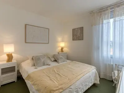 Un ou plusieurs lits dans un hébergement de l'établissement Maison Confort pour 8 avec Piscine Sécurisée, Wifi, à 100m de la Plage, Châtelaillon-Plage - FR-1-258-193