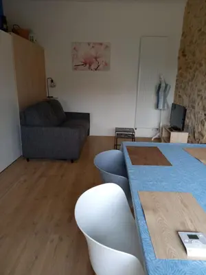 Coin salon dans l'établissement Gîte la petite maison