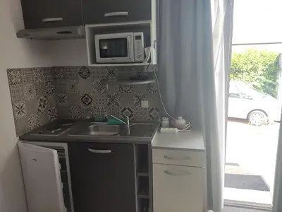 Cuisine ou kitchenette dans l'établissement Les Gites Lussacois