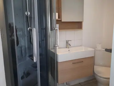 Salle de bains dans l'établissement Le Corto