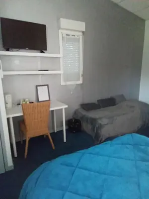 Un ou plusieurs lits dans un hébergement de l'établissement Hôtel Bon Repos