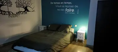 Un ou plusieurs lits dans un hébergement de l'établissement Gîte de La Bicyclette