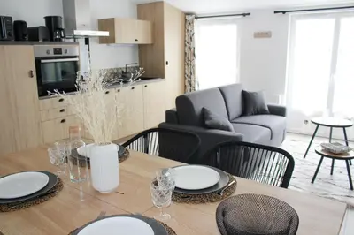 Cuisine ou kitchenette dans l'établissement Aux Quereux de Bel Air