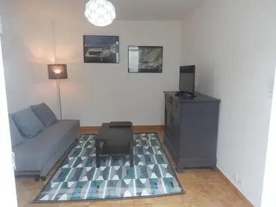 Coin salon dans l'établissement Appartement T2 ou T1 côté cour/jardin avec garage
