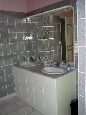 Salle de bains dans l'établissement L'Oasis