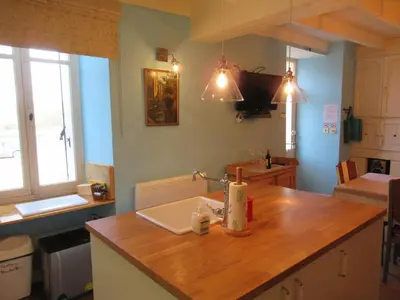 Cuisine ou kitchenette dans l'établissement La Maison de Riviere