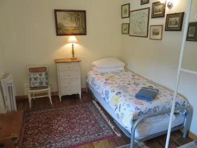 Un ou plusieurs lits dans un hébergement de l'établissement La Maison de Riviere