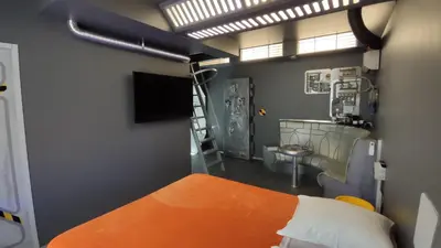 Un ou plusieurs lits dans un hébergement de l'établissement Le Making Of Chambres d'Hôtes insolites et Familiales