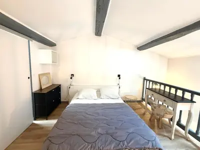 Un ou plusieurs lits dans un hébergement de l'établissement Petite maison tout confort