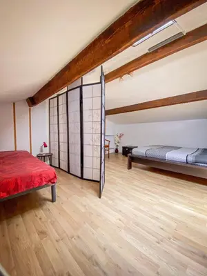 Un ou plusieurs lits dans un hébergement de l'établissement Ryokan Lankana
