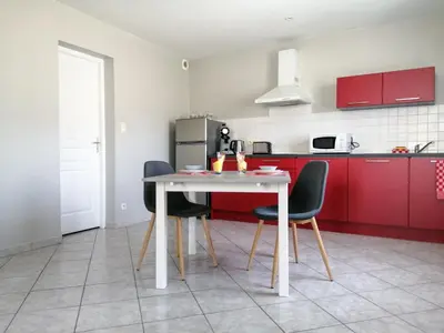 Cuisine ou kitchenette dans l'établissement Le 32