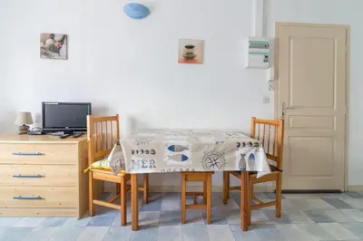 Télévision ou salle de divertissement dans l'établissement ile de Nole