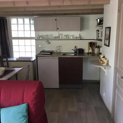 Cuisine ou kitchenette dans l'établissement La Remise