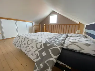 Un ou plusieurs lits dans un hébergement de l'établissement CENTRE CHATELAILLON GRAND LOFT ** 100m DE LA PLAGE